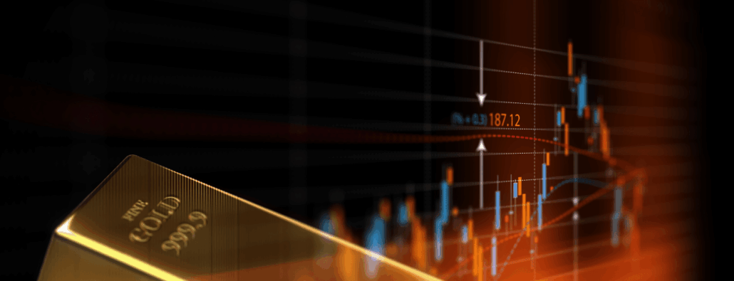Image of a gold bar in front of a stock ticker in blue and red.
